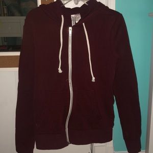 Divided maroon zip up hoodie